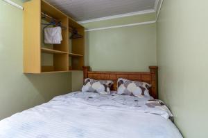 Postel nebo postele na pokoji v ubytování AnD Suites