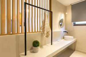 Koupelna v ubytování Calmare suites