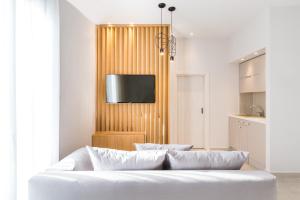 Postel nebo postele na pokoji v ubytování Calmare suites