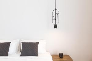 Postel nebo postele na pokoji v ubytování Calmare suites