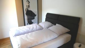 Postel nebo postele na pokoji v ubytování IchZeit Aparthotel