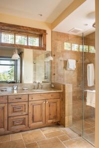 a bathroom with a sink and a shower at Hoos Views in Big Sky Mountain Village