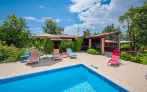 The swimming pool at or close to Hacienda RoseMary