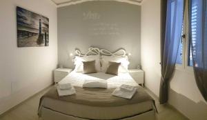 Letto o letti in una camera di I Quattro Elementi