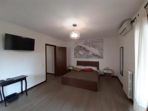 Postel nebo postele na pokoji v ubytování Nottetempo Verona