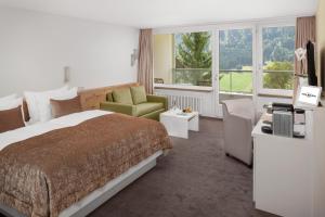 Postel nebo postele na pokoji v ubytování Hotel Waldegg - Adults only