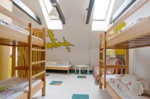 
A bunk bed or bunk beds in a room at Pogo Hostel
