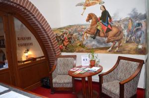 Ein Sitzbereich in der Unterkunft Hotel Petr