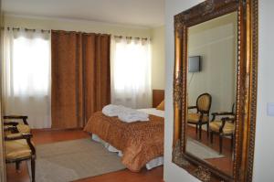 Quinta Rota d' Oliveira tesisinde bir odada yatak veya yataklar