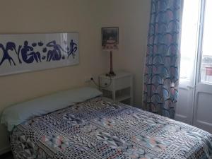 A bed or beds in a room at Can Bonshoms