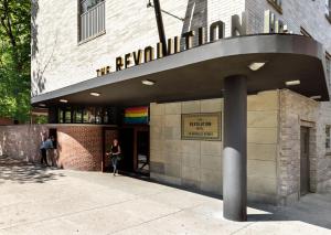 a building with a sign that reads the reynoldsulumulum at The Revolution Hotel in Boston