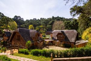 a small village with a large stone building at Pousada Da Pedra in Campos do Jordão