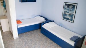Posteľ alebo postele v izbe v ubytovaní Nanas Apartment