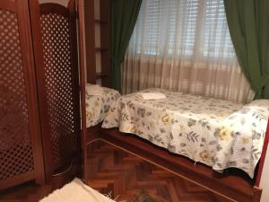 Postel nebo postele na pokoji v ubytování apartamento centrico cambados