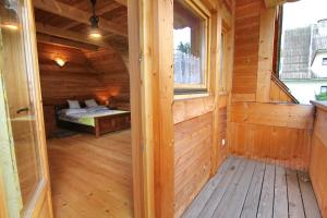 Posteľ alebo postele v izbe v ubytovaní Domek Koziniec Zakopane