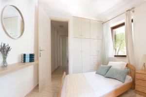 Ένα ή περισσότερα κρεβάτια σε δωμάτιο στο Apartment in Peania (15min from Airport)