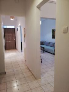 A bed or beds in a room at Pomegranate apartment