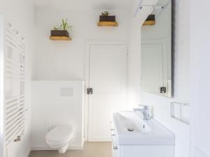 Koupelna v ubytování Le Passage - appartement lumineux à La Madeleine