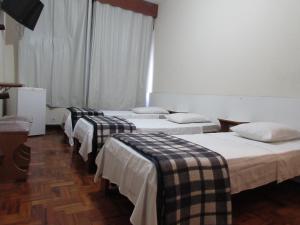 Cama o camas de una habitación en Pax Hotel , próximo da 25 de Março, Brás, Bom Retiro e República