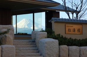 a view of a mountain from a building with stairs at Izu Mitohama Shotokan in Numazu