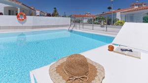 The swimming pool at or close to Bungalows Adonis