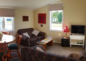 A seating area at Kumara Historic Cottages