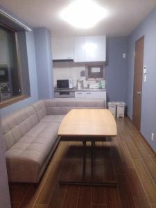 Kuchyň nebo kuchyňský kout v ubytování Nice Hostel Yahiro