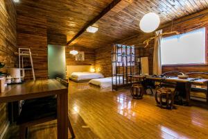 Ένα ή περισσότερα κρεβάτια σε δωμάτιο στο HOME++ Xi'an