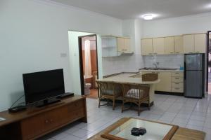 A kitchen or kitchenette at Apartemen Senayan