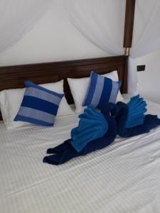 Voodi või voodid majutusasutuse The Wave's Guest House toas