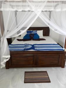 Voodi või voodid majutusasutuse The Wave's Guest House toas