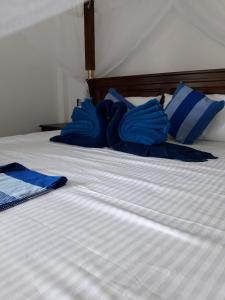 Voodi või voodid majutusasutuse The Wave's Guest House toas