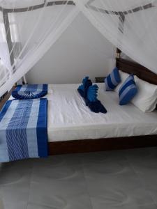 Voodi või voodid majutusasutuse The Wave's Guest House toas
