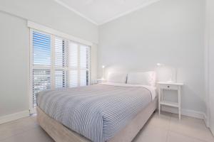Voodi või voodid majutusasutuse Mirra Chana Beachfront Apartments Mooloolaba toas
