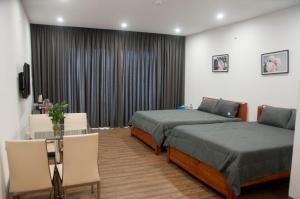 Posezení v ubytování Nếp Apartment Hotel