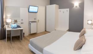 Posteľ alebo postele v izbe v ubytovaní Nuovo Albergo Centro