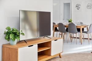 A television and/or entertainment center at Applecross Village Residence