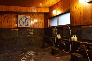 Koupelna v ubytování Forest Inn Sangoro
