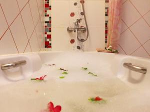 a bath tub filled with water with debris at Baan Boa Resort in Patong Beach