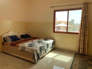 Postel nebo postele na pokoji v ubytování Aljabal Al Akhdar Olive Tree Guest house