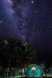 a starry night with a building with the milky way at Talek Bush Camp , Masai Mara in Talek