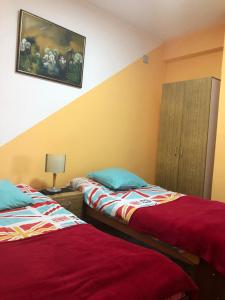 Katil atau katil-katil dalam bilik di Swiss Hostel