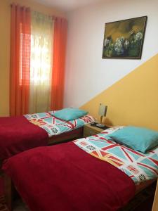 Katil atau katil-katil dalam bilik di Swiss Hostel