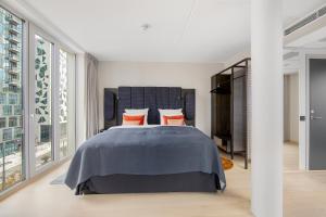 Postel nebo postele na pokoji v ubytování Clarion Hotel Oslo