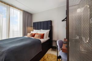 Postel nebo postele na pokoji v ubytování Clarion Hotel Oslo