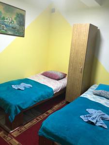 Katil atau katil-katil dalam bilik di Swiss Hostel