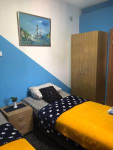 Postel nebo postele na pokoji v ubytování Swiss Hostel