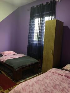 Katil atau katil-katil dalam bilik di Swiss Hostel