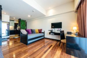 Suite @ Sunway Pyramid Mall的电视和/或娱乐中心