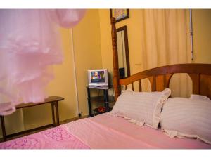 Postel nebo postele na pokoji v ubytování Merona Hotel